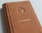 Preview: Stammbuch "Herz" aus cognacbraunem Nubukleder
