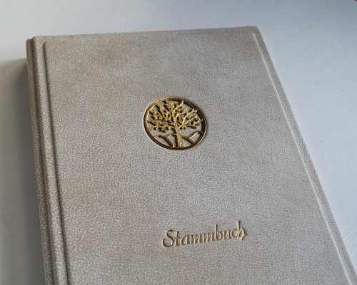 Stammbuch "Goldene Lebensbaum" mit goldenem Schrift aus beigem Büffelleder,  DIN A4